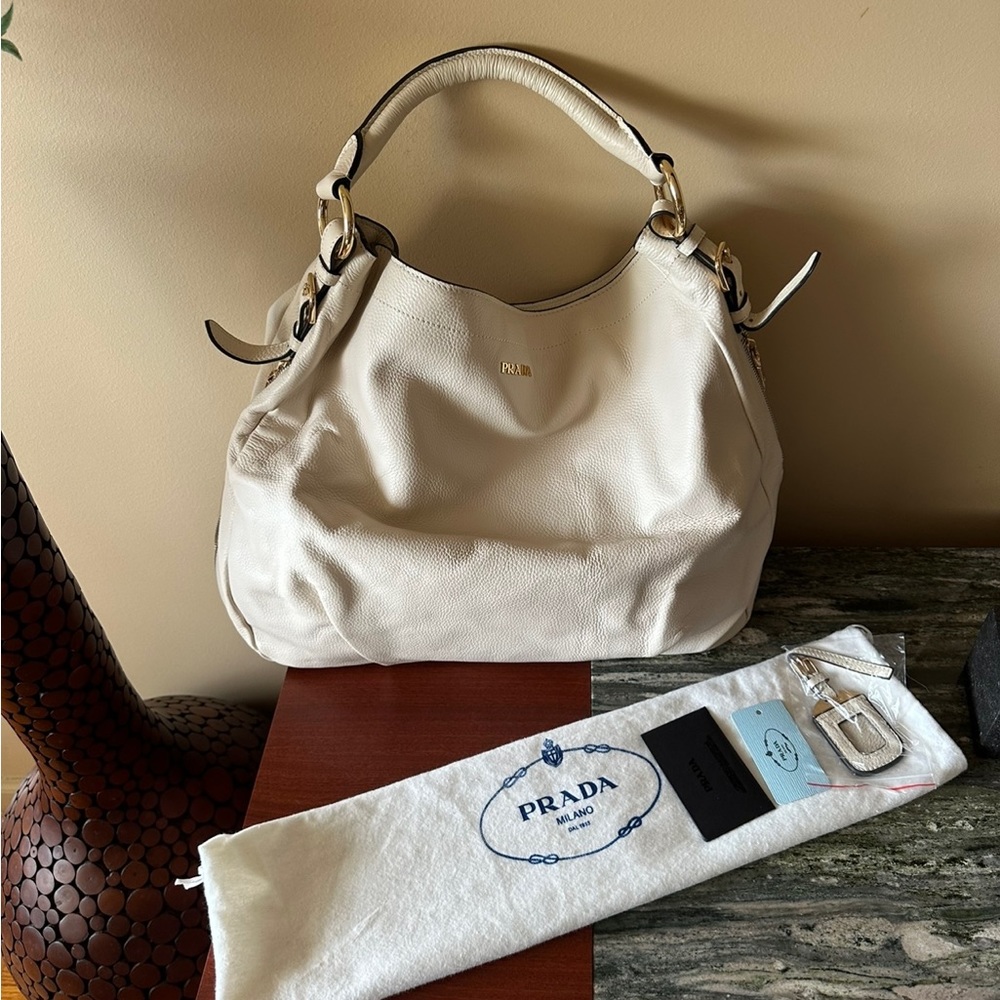 New highest quality and design leather Handbag.W19.5”,H16.5”.Bought inHongKong.